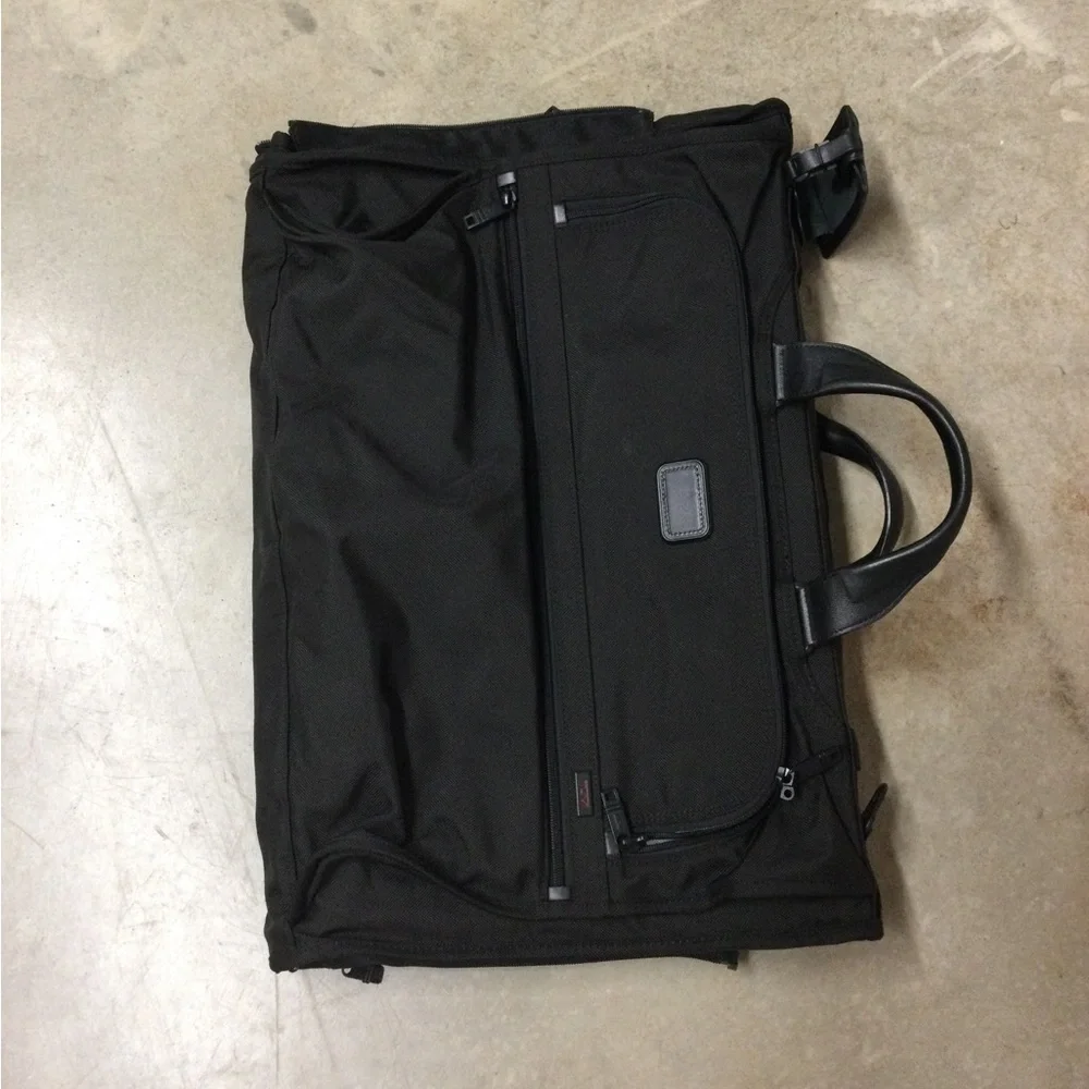 Tumi Black Men's Travel Duffel with Front Zip Pocket and Carry Handles